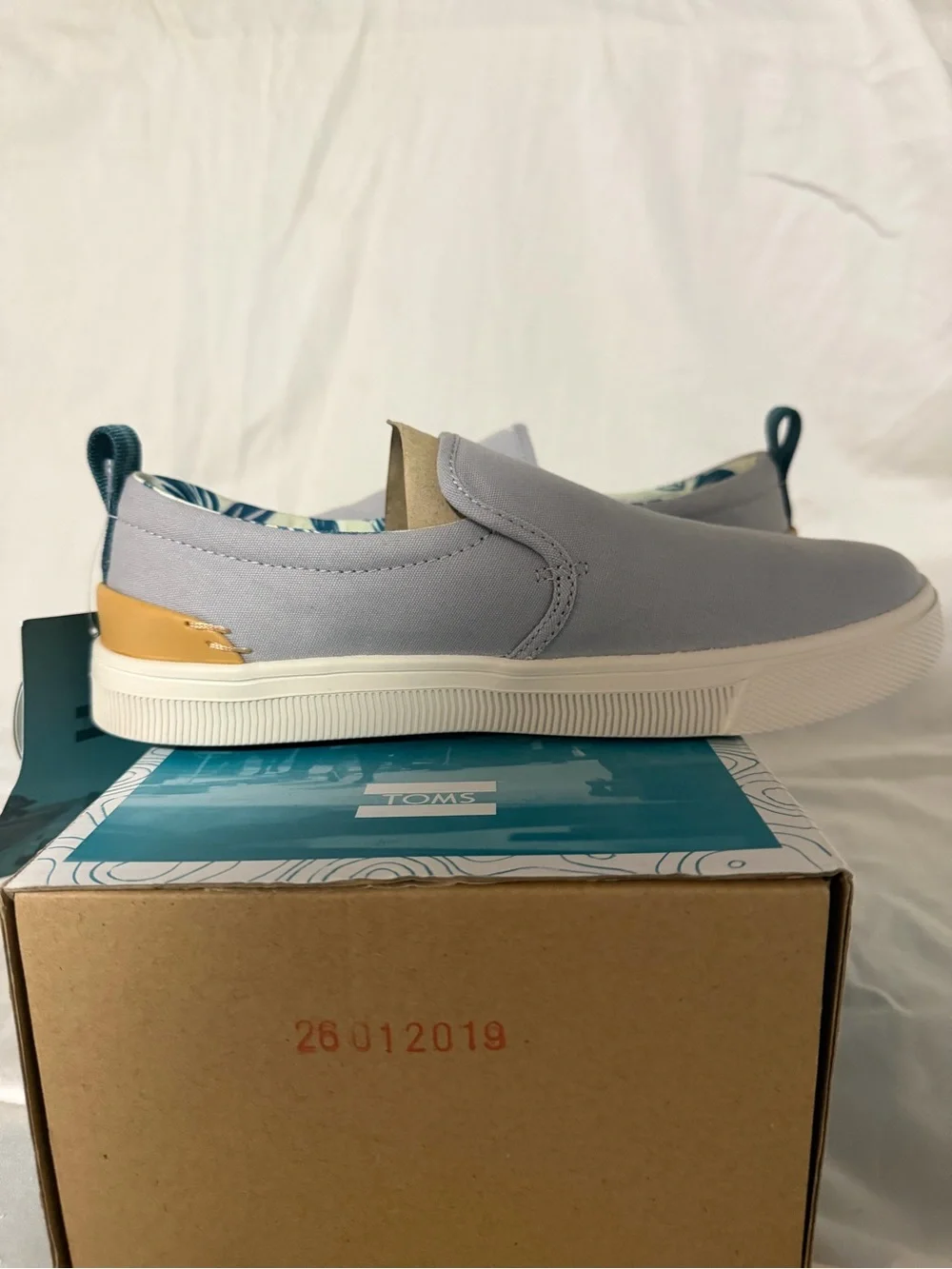 Toms Women’s Slip-On Sneakers in Light Gray and Cream Sole